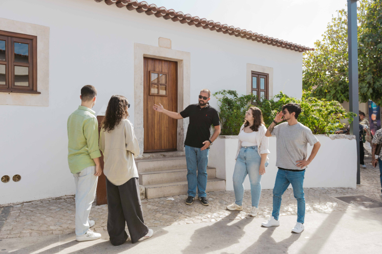 group of tourists visiting the famous little sheperds from Fátima house. Associated with the  religious miracle of Fátima