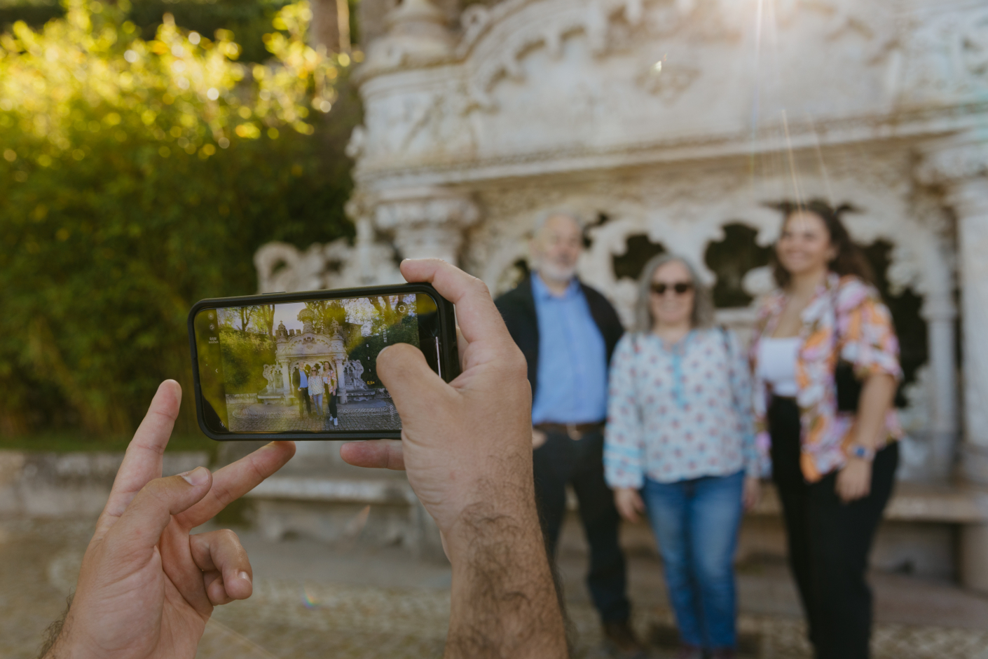 group of tourists taking a photo at Quinta da Regaleira